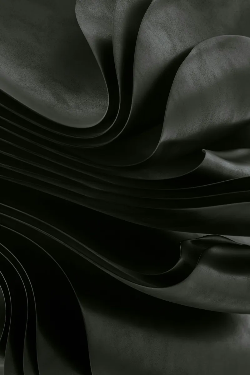 Abstract dark flowing fabric with dramatic texture